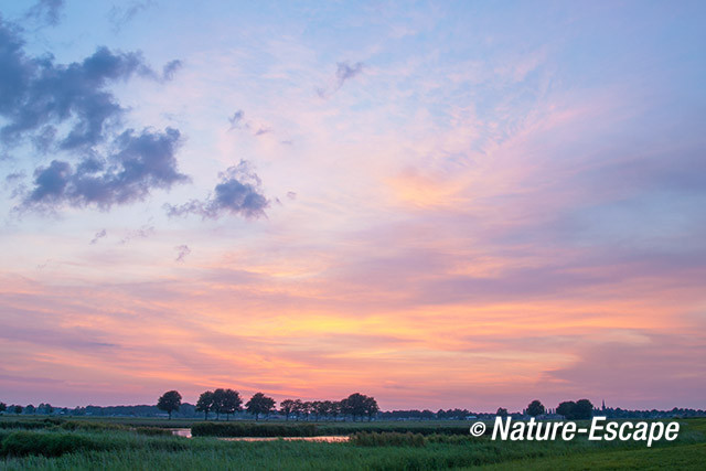 Zonsondergang, ondergaande zon, bij waterberging, Wogmeer 2 240714